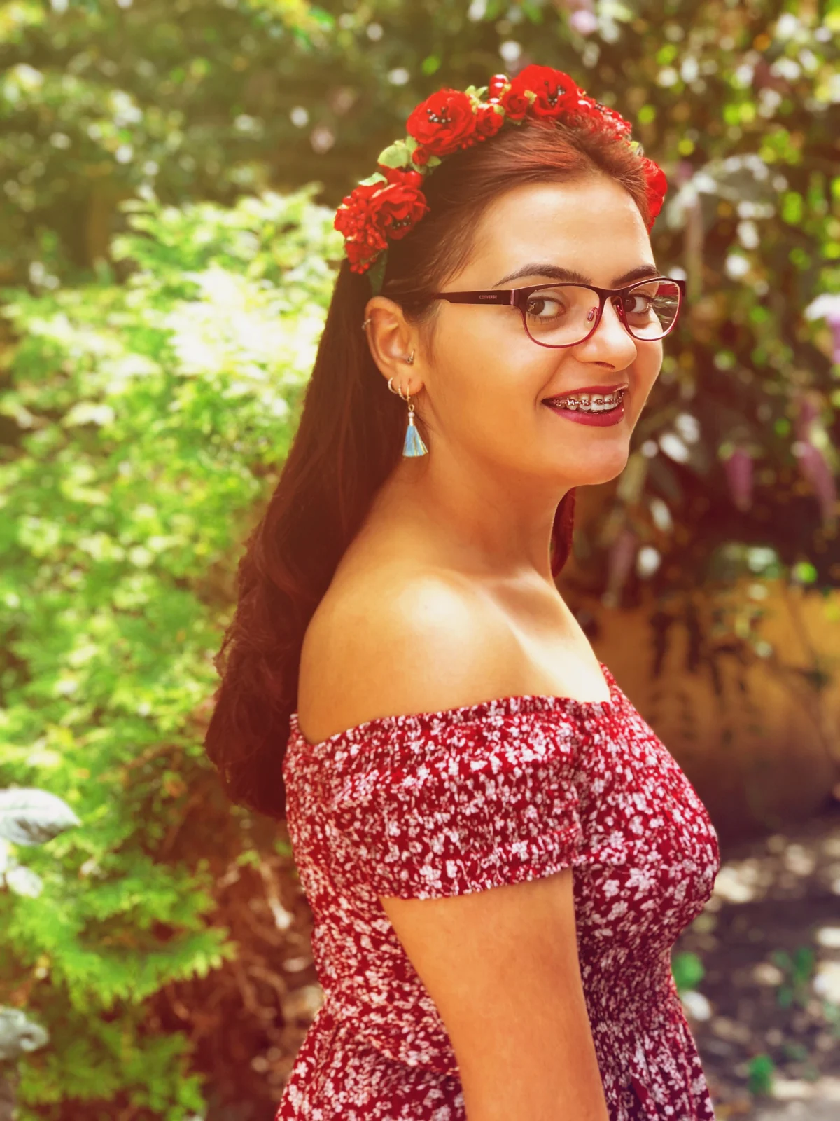 Portrait with a red flower crown